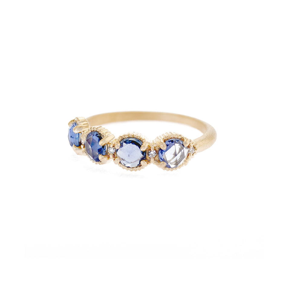 Handmade stacking wedding band or anniversary gift with rose cut blue sapphires and diamond accents with ribbing in 18K yellow gold by Designer Megan Thorne