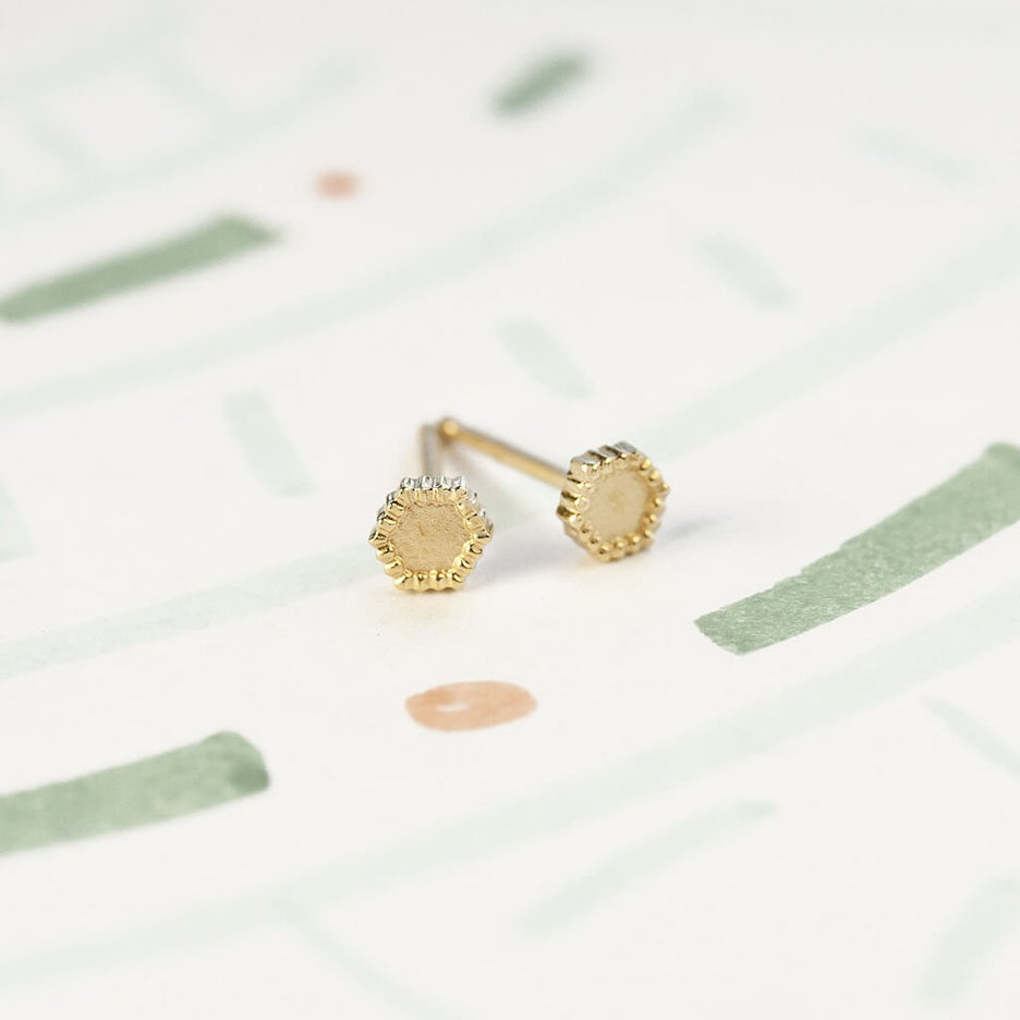 Handmade simple everyday hexagon studs with ribbed details in 18K yellow gold by Designer Megan Thorne