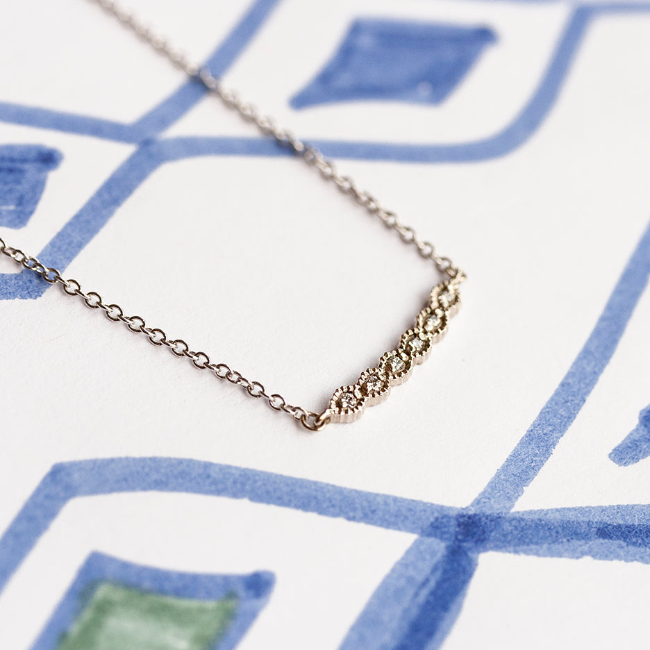 Handmade diamond necklace with vintage inspired ribbing in 18K white gold by Designer Megan Thorne