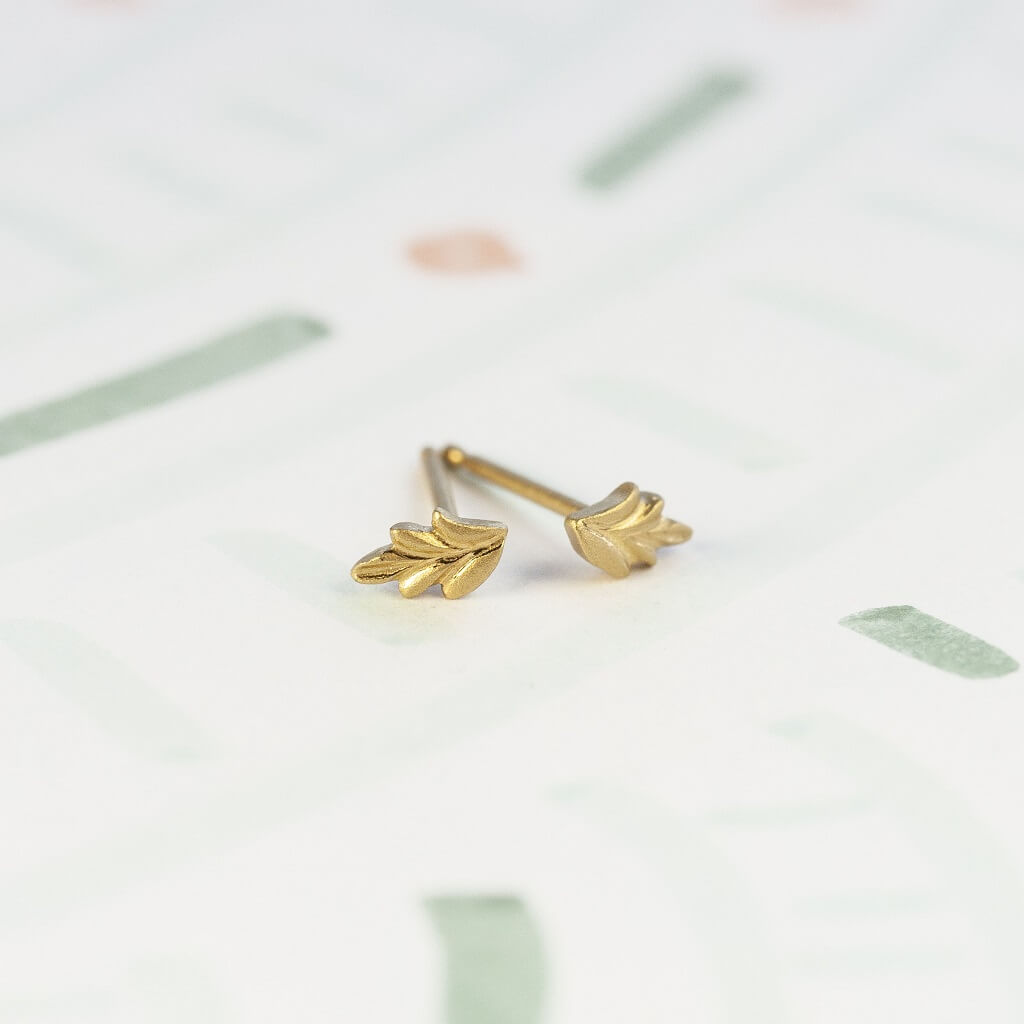 Handmade everyday stud earrings with hand carved botanical Wood Nymph details in 18K yellow gold by Designer Megan Thorne