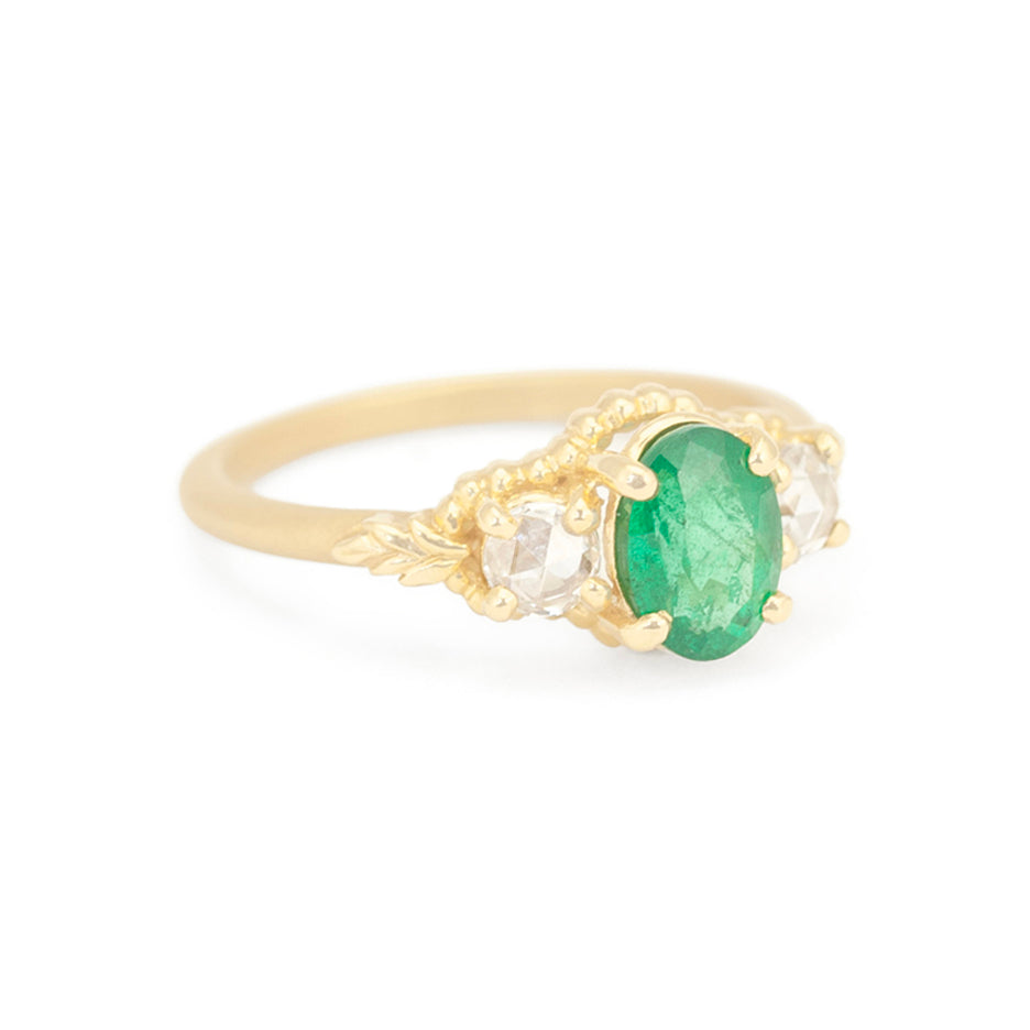 Emerald 3 Stone Engagement Ring in Yellow Gold with Botanical Detailing Side View