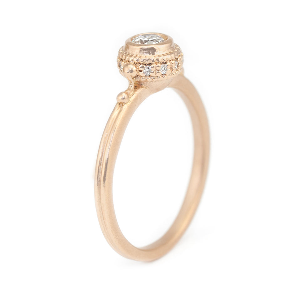 Diamond Engagement Ring in Rose Gold with Detailing Through Finger View