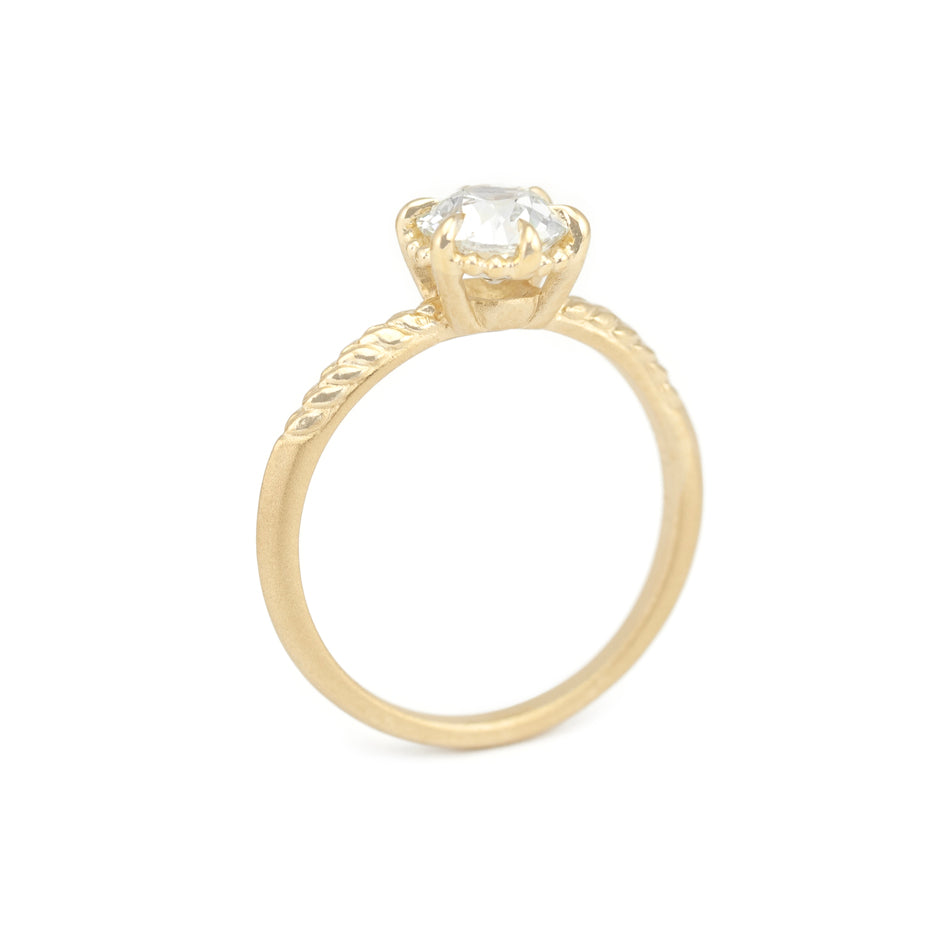 Diamond Wedding Ring in Yellow Gold with Detailing Through Finger View
