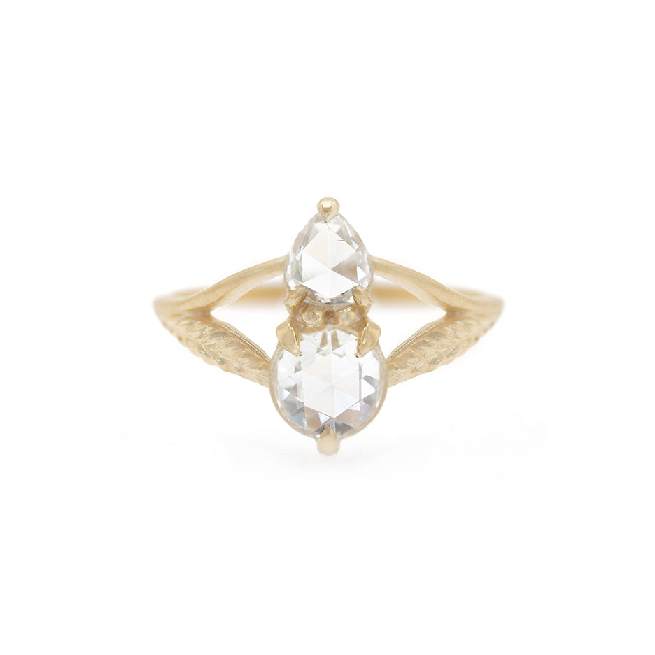 Handmade alternative engagement or statement ring with 2 antique rose cut diamonds and split shank with Evergreen botanical details in 18K yellow gold by Designer Megan Thorne
