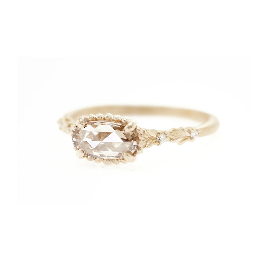 Handmade engagement ring with champagne rose cut diamond with floral details and diamond accents in 18K yellow gold by Designer Megan Thorne