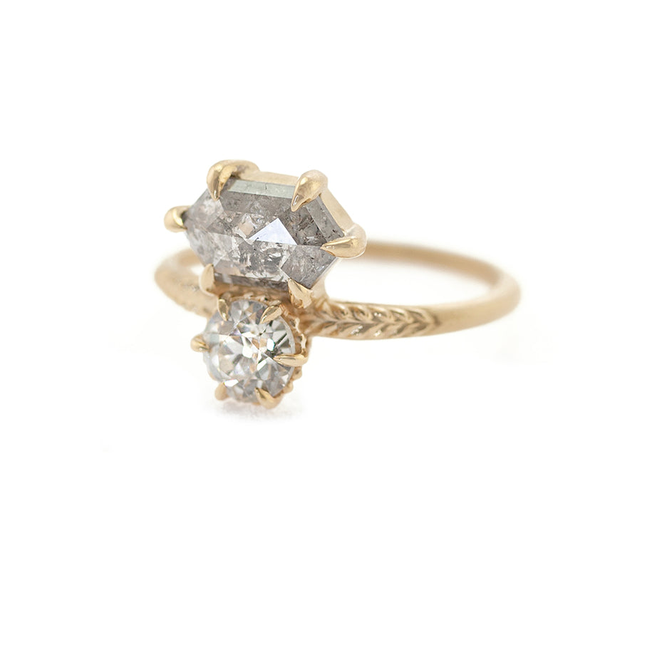 Handmade Toi et Moi 2 stone engagement ring with salt and pepper hexagon diamond and antique old European cut diamond with Evergreen details on 18K yellow gold shank by Designer Megan Thorne