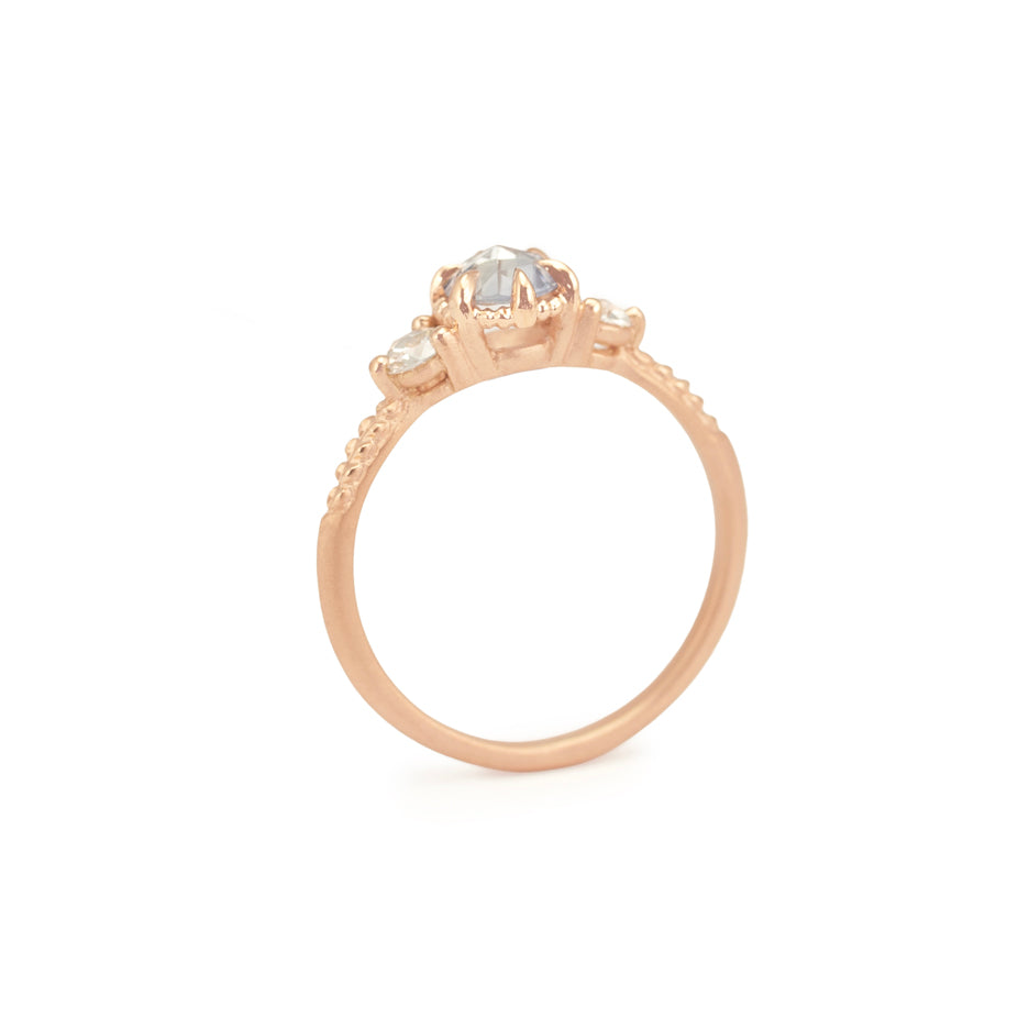 Blue Rose Cut Sapphire Ring in Rose Gold with Detailing Through Finger View