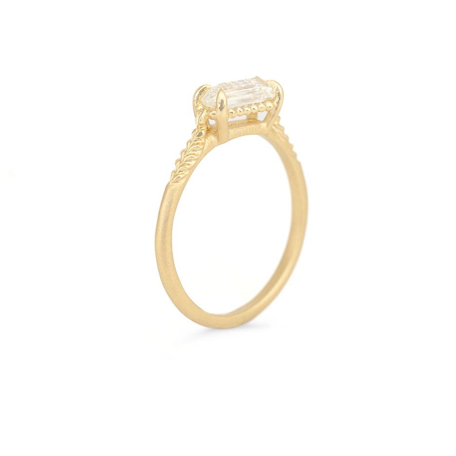 Diamond Ring in Yellow Gold with Detailing Through Finger View