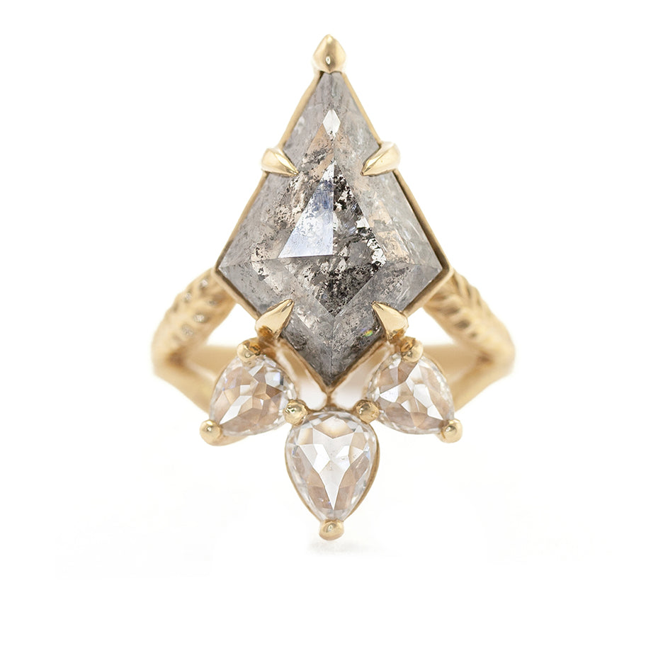 Handmade statement engagement ring with fancy kite shaped salt and pepper diamond and rose cut pear diamond accents split shank with botanical Evergreen details in 18K yellow gold by Designer Megan Thorne