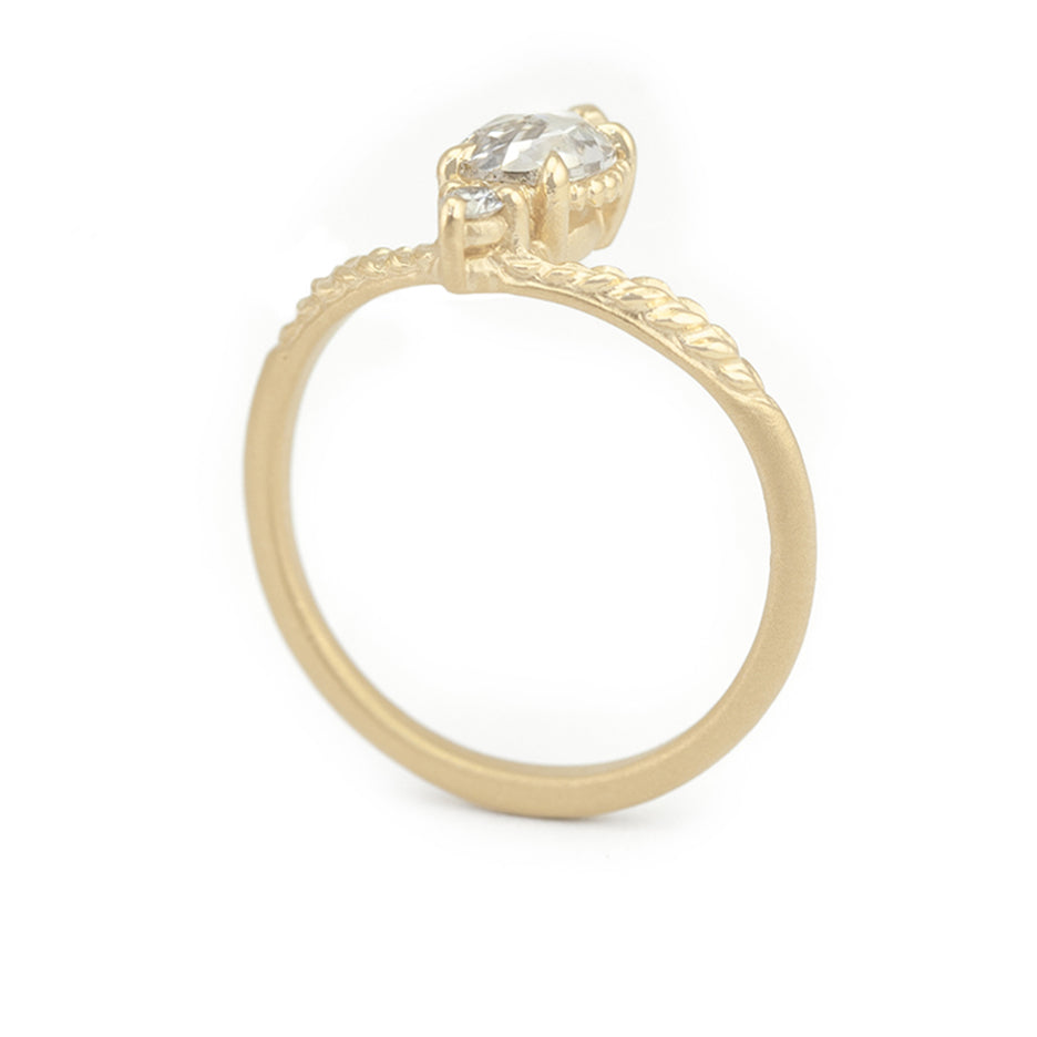 Rose Cut Diamond Non Traditional Engagement Ring in Yellow Gold with Detailing Through Finger View
