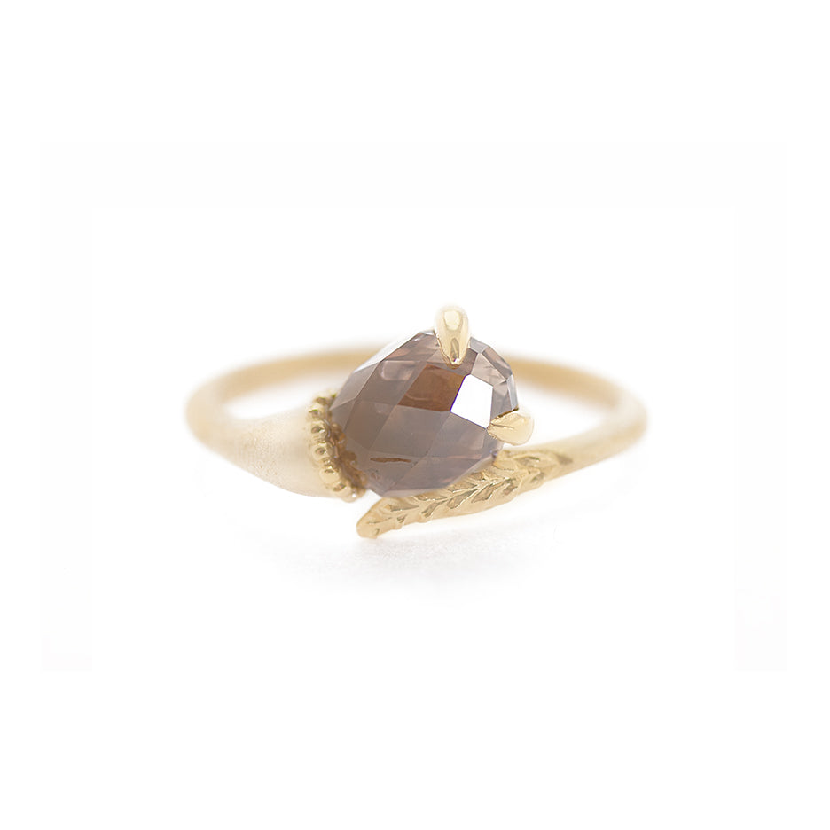 Handmade alternative engagement ring featuring unique richly colored brown briolette diamond and botanical Evergreen details in 18K yellow gold by Designer Megan Thorne
