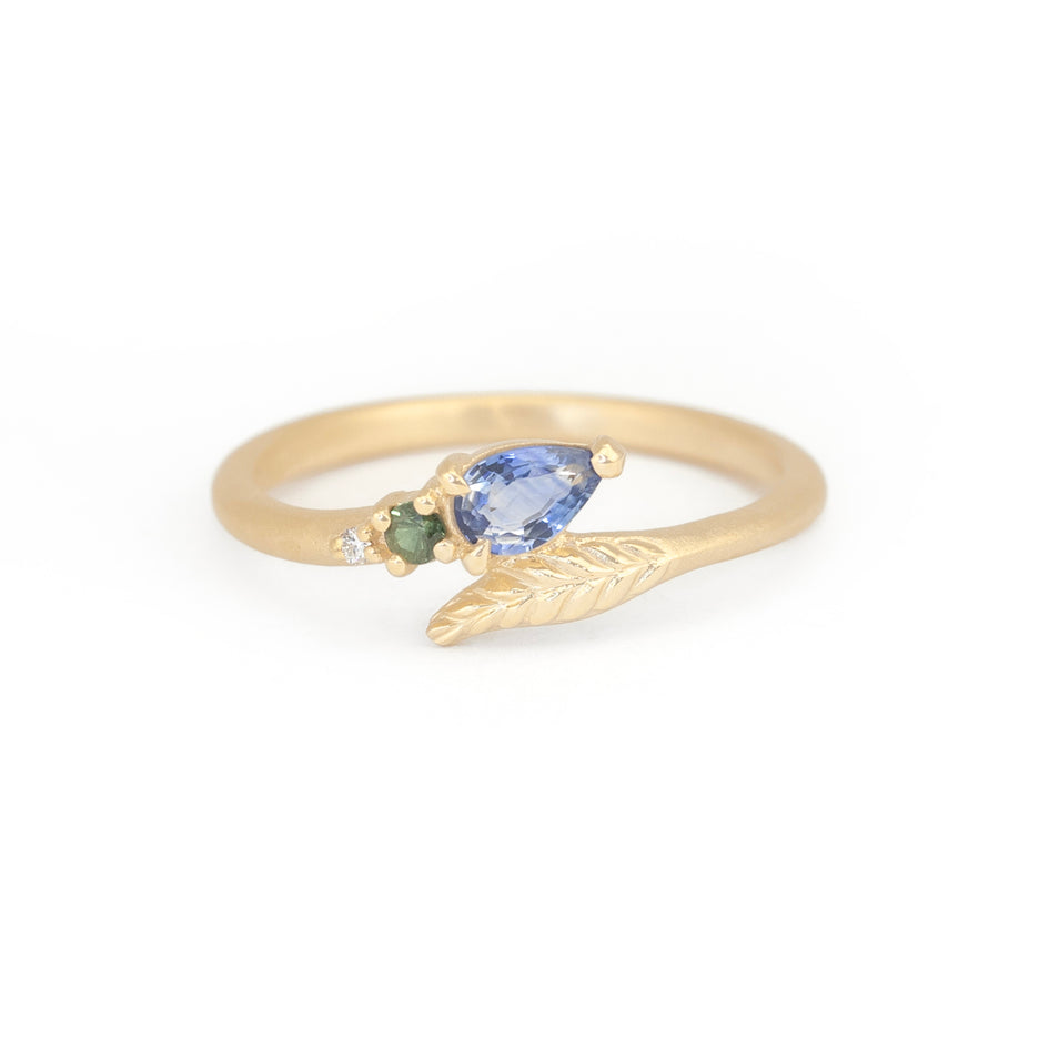 Blue Sapphire Ring in Yellow Gold with Botanical Detailing Front View