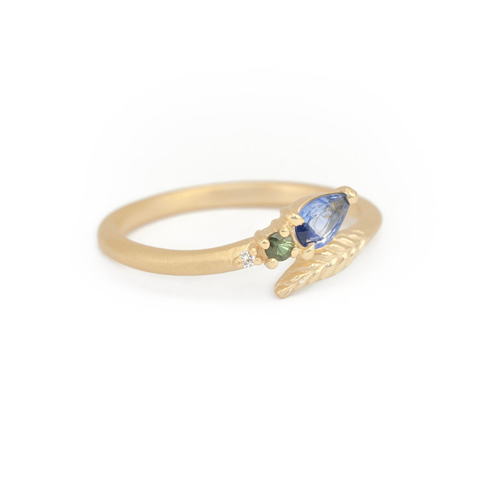 Blue Sapphire Ring in Yellow Gold with Botanical Detailing Front View