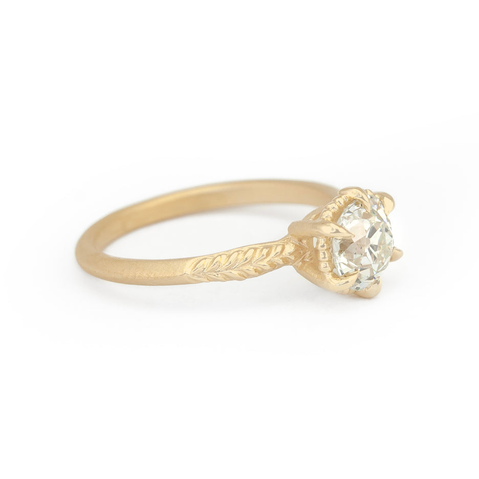 Antique Diamond Ring in Yellow Gold with Botanical Detailing Three Quarter View