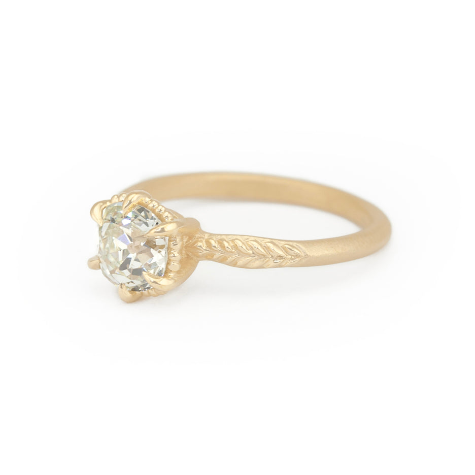 Antique Diamond Ring in Yellow Gold with Botanical Detailing Three Quarter View