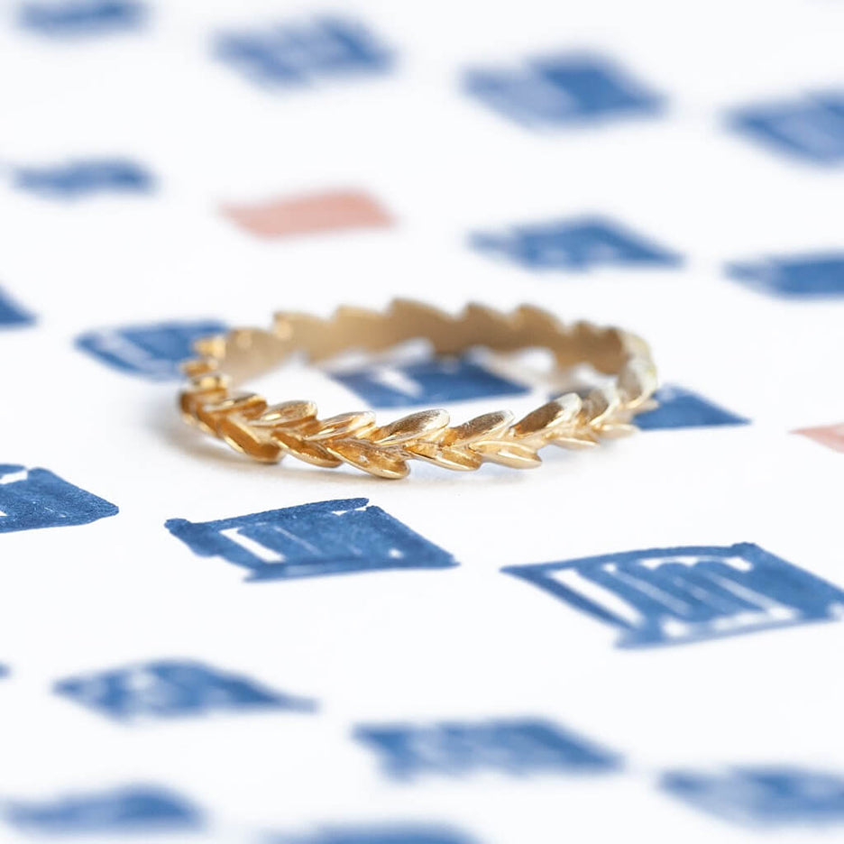 Handmade floral botanical inspired wedding or stacking band hand carved in 18K yellow gold by Designer Megan Thorne