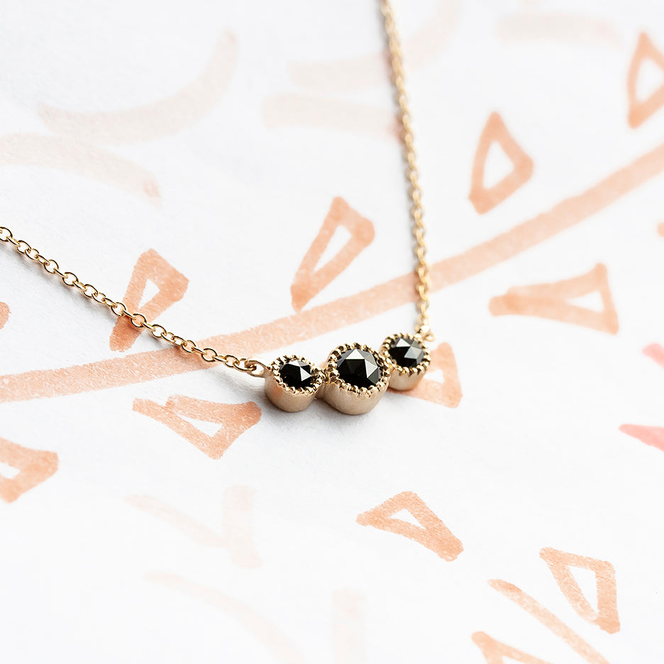 Handmade Picot necklace with three lacy bezel set black rose cut diamonds in 18K yellow gold by Designer Megan Thorne