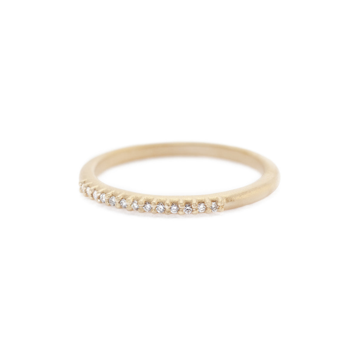 Handmade classic wedding band with pave set diamonds in 18K yellow gold. Perfect stacking band by Designer Megan Thorne