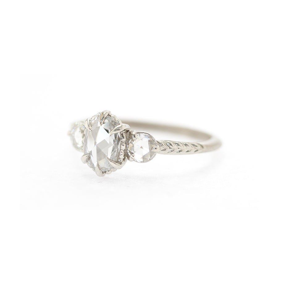 Handmade 3-stone engagement ring with rose cut diamonds in 18K white gold by Designer Megan Thorne