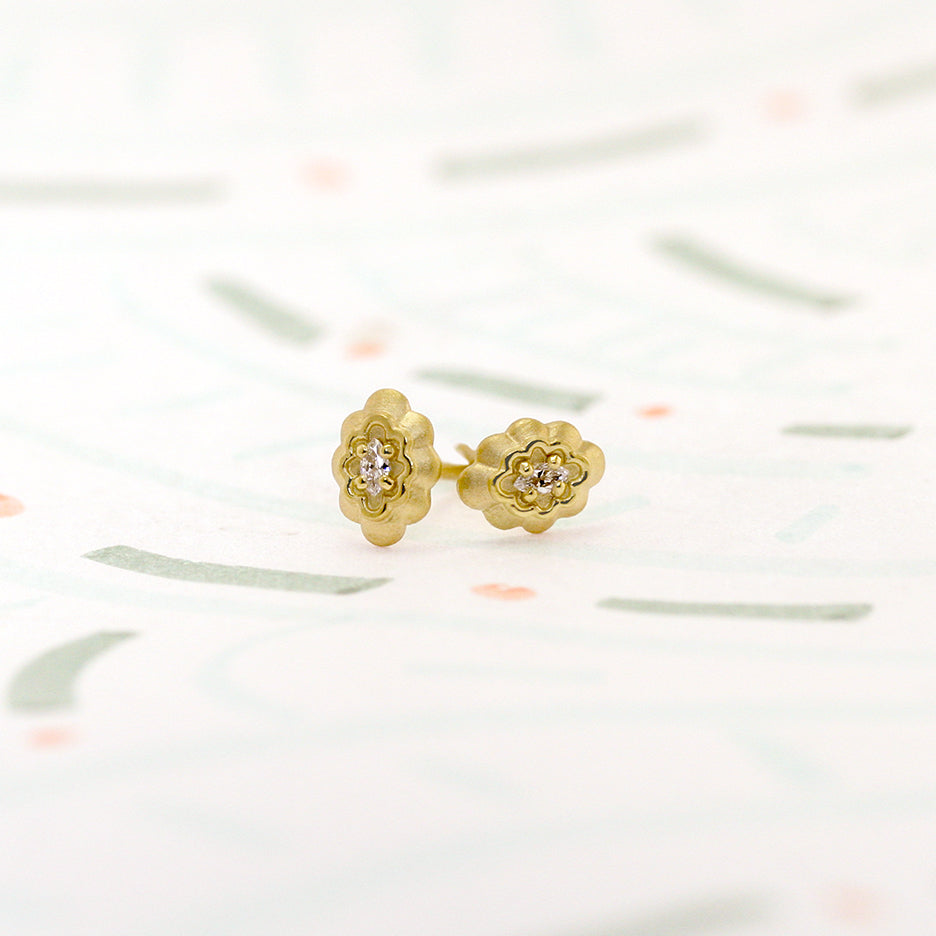 Handmade everyday marquise diamond studs with double scallop bezel and beaded prongs in 18K yellow gold by Designer Megan Thorne 