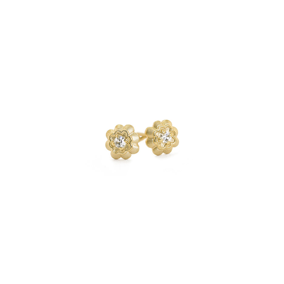 Handmade diamond studs with single cut diamonds set in a double scallop with prongs in 18K yellow gold by Designer Megan Thorne 