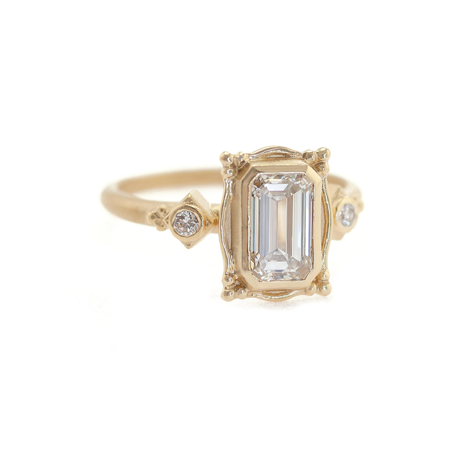 Handmade picture frame engagement ring vintage inspired setting with emerald cut diamond and diamond accents in 18K yellow gold by Designer Megan Thorne