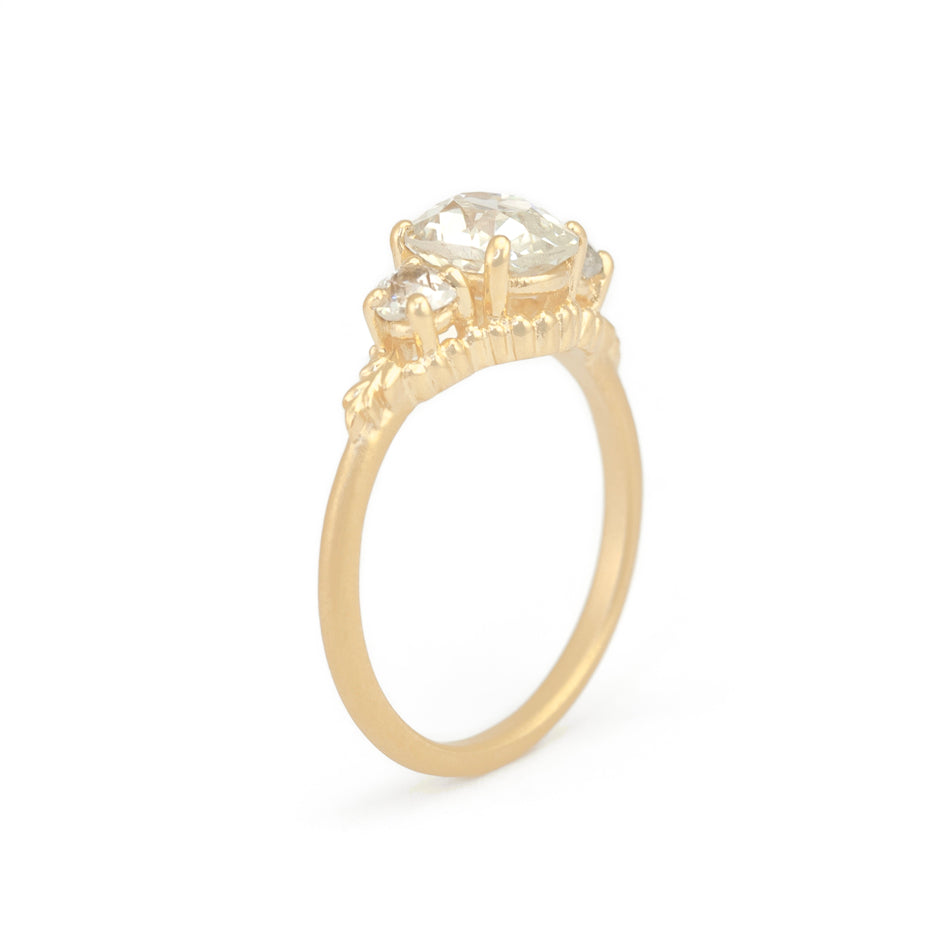 Antique Diamond Ring in Yellow Gold with Botanical Detailing Through Finger View