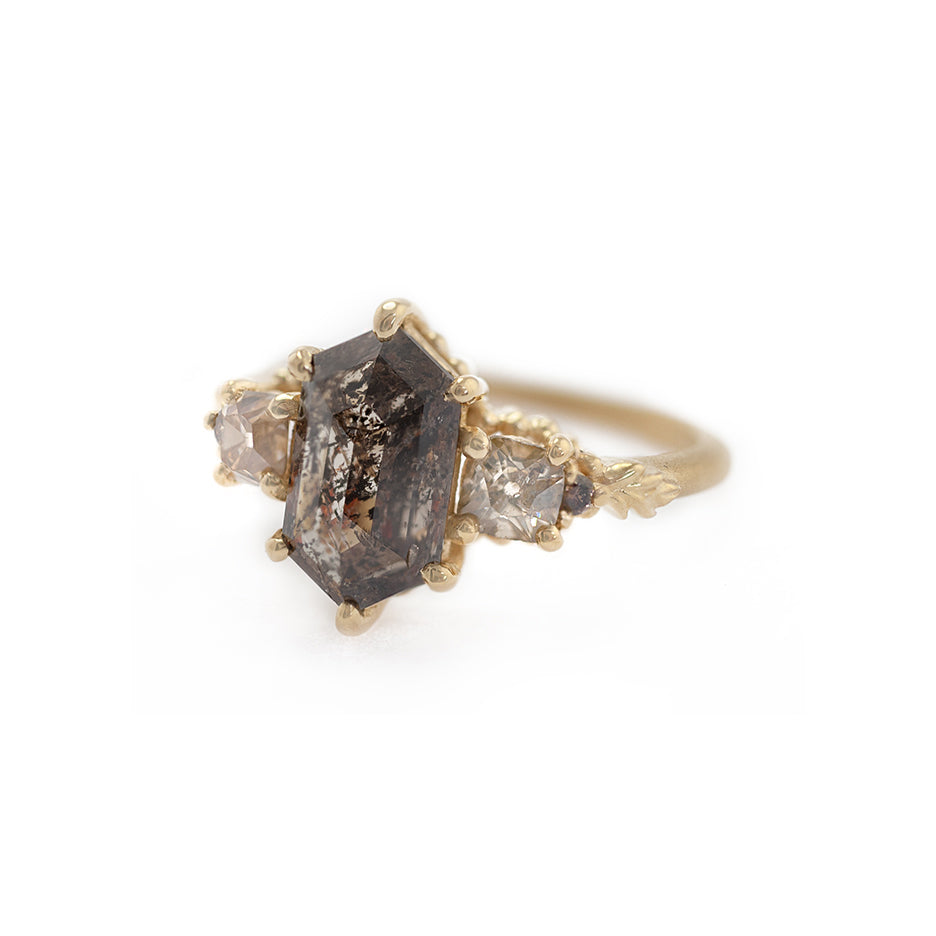 Handmade alternative engagement or statement ring with 1.8ct hexagon salt and pepper diamond and brown accent diamonds with floral Wood Nymph details in 18K yellow gold by Designer Megan Thorne