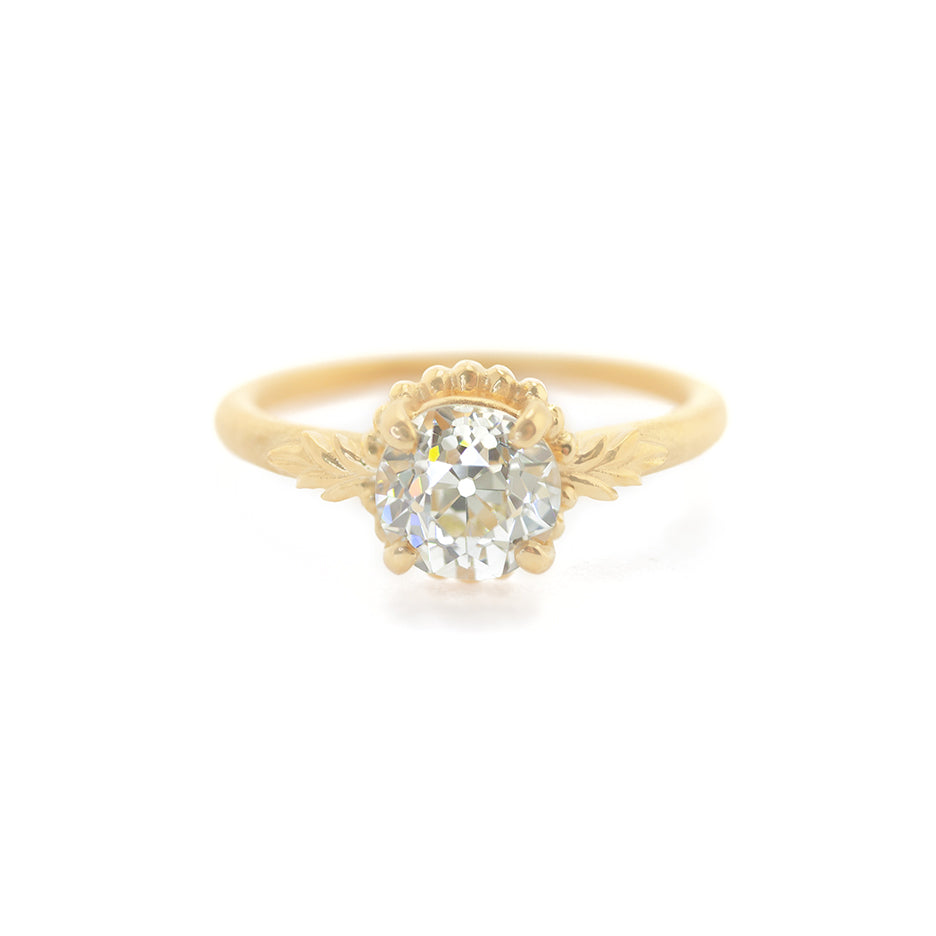Handmade classic engagement ring with 1.31ct Old European Cut diamond with beading and floral details in 18K yellow gold by Designer Megan Thorne
