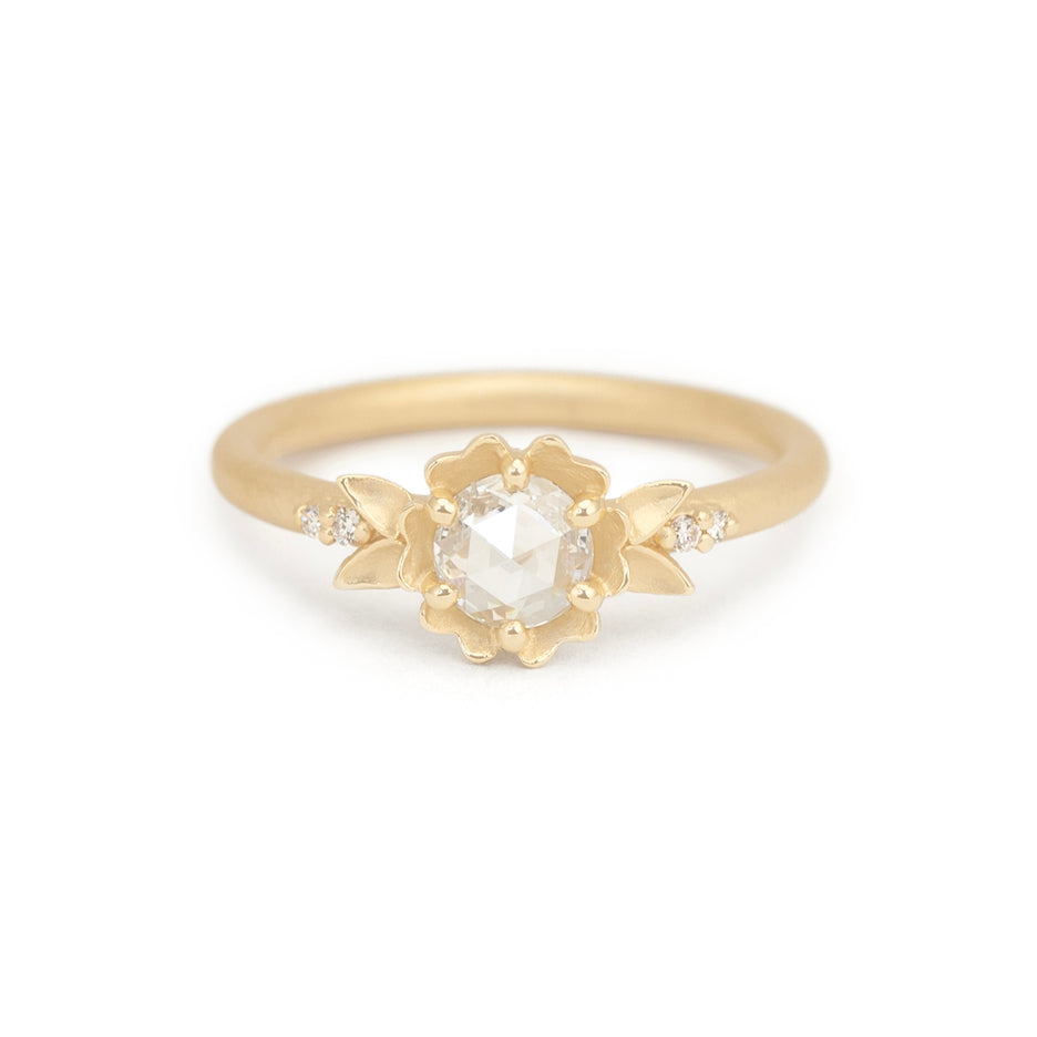 Handmade floral engagement ring with rose cut diamond center stone and delicate diamond accents in 18K yellow gold by Designer Megan Thorne Front View