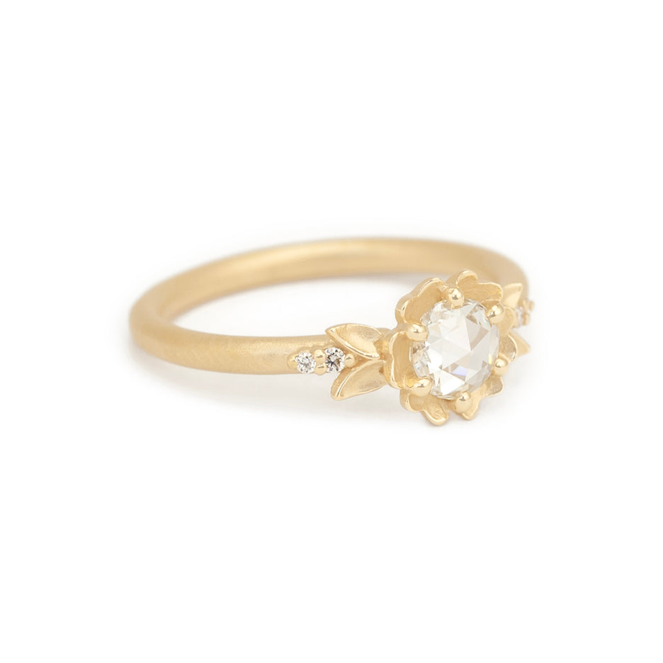 Handmade floral engagement ring with rose cut diamond center stone and delicate diamond accents in 18K yellow gold by Designer Megan Thorne Side View