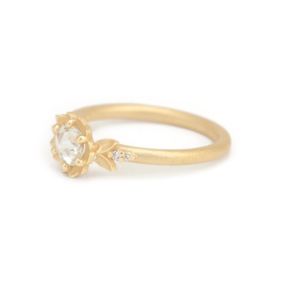 Handmade floral engagement ring with rose cut diamond center stone and delicate diamond accents in 18K yellow gold by Designer Megan Thorne Side View