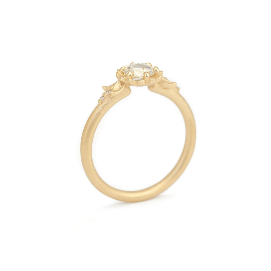 Handmade floral engagement ring with rose cut diamond center stone and delicate diamond accents in 18K yellow gold by Designer Megan Thorne Through Finger View
