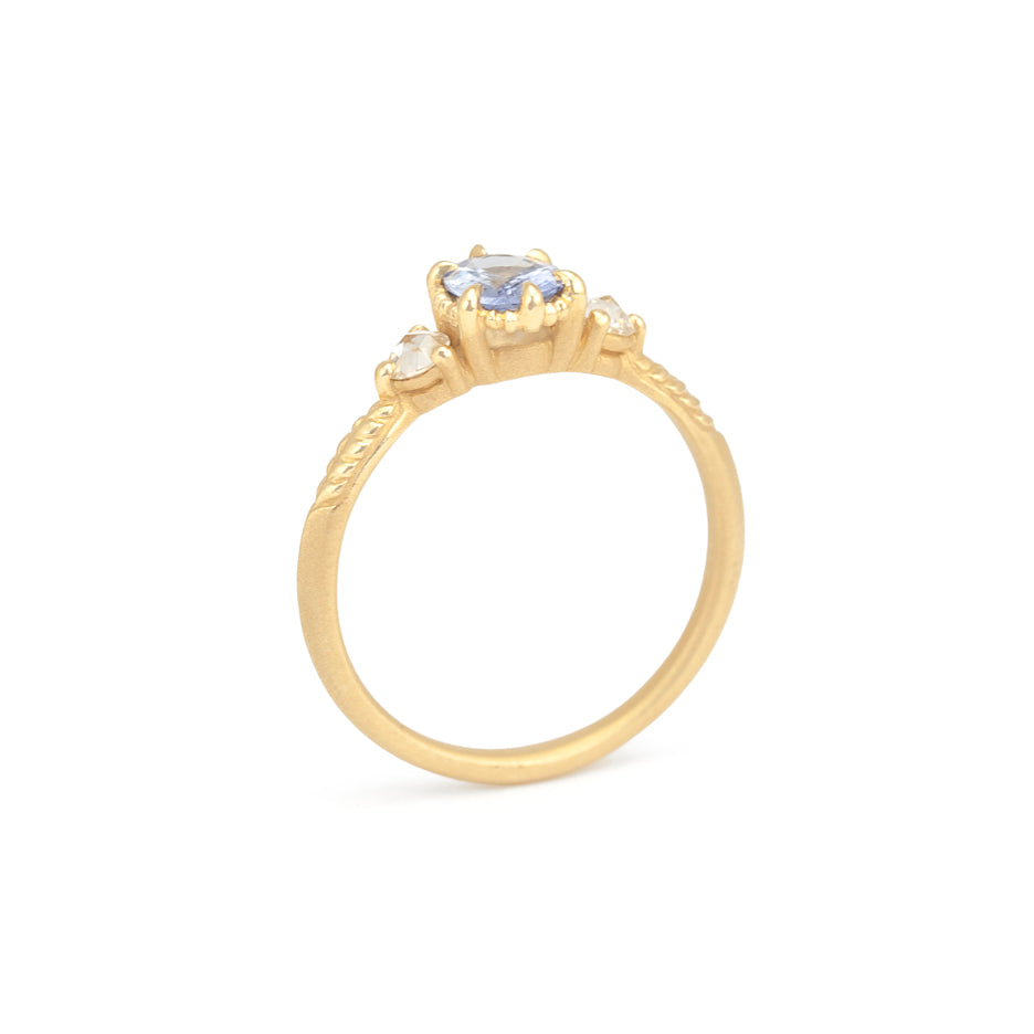 Blue Sapphire Engagement Ring in Yellow Gold with Detailing Through Finger View