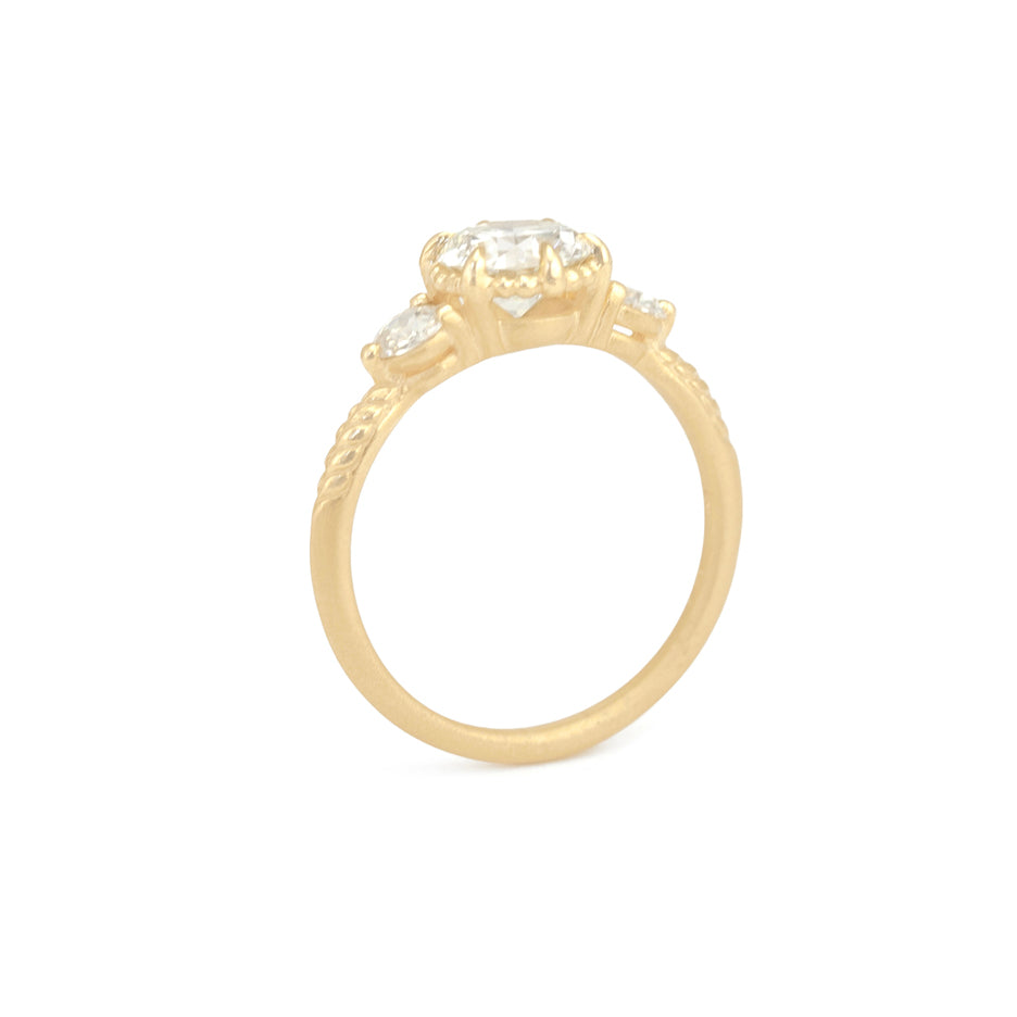 Diamond Engagement Ring in Yellow Gold with Botanical Detailing Through Finger View