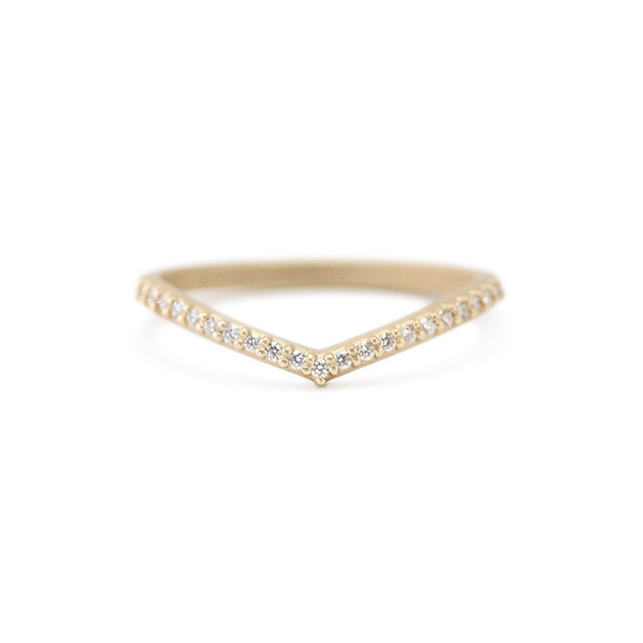 pave diamond wedding band in yellow gold