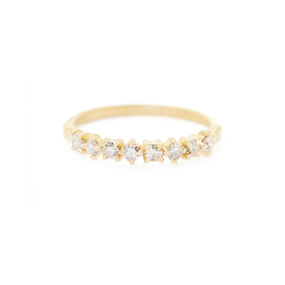 Handmade wedding or stacking band with single cut diamonds and Evergreen botanical details in 18K yellow gold by Designer Megan Thorne