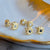 Salt and Pepper Diamond Earrings in Yellow Gold with Detailing Front View