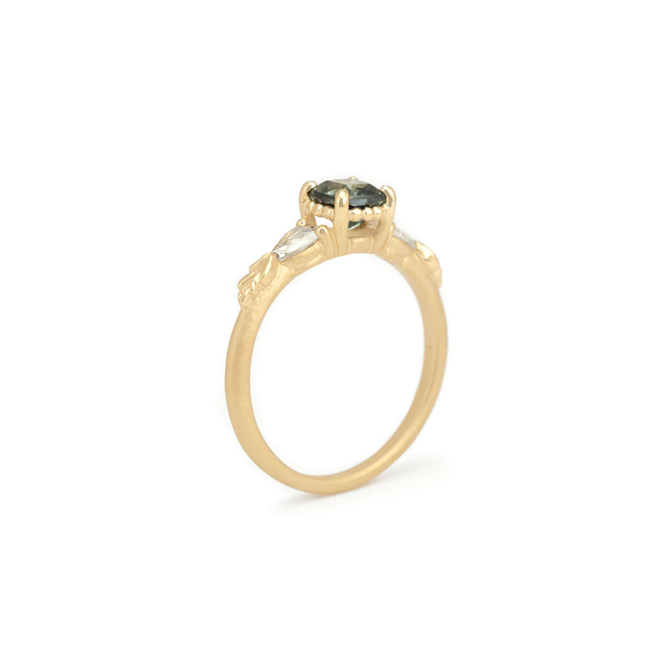 Colored Sapphire Engagement Ring in Yellow Gold with Botanical Detailing Through Finger View