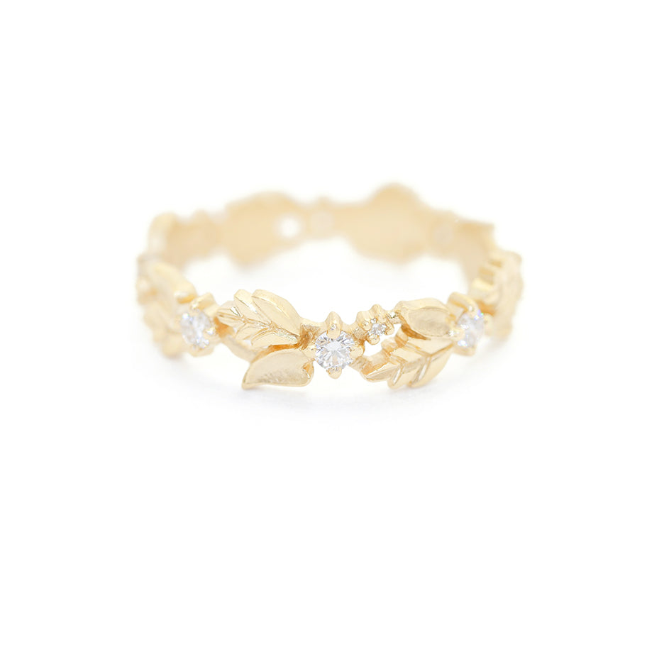 Handmade wide eternity wedding band or stacking ring with diamonds and hand carved floral Wood Nymph details in 18K yellow gold by Designer Megan Thorne