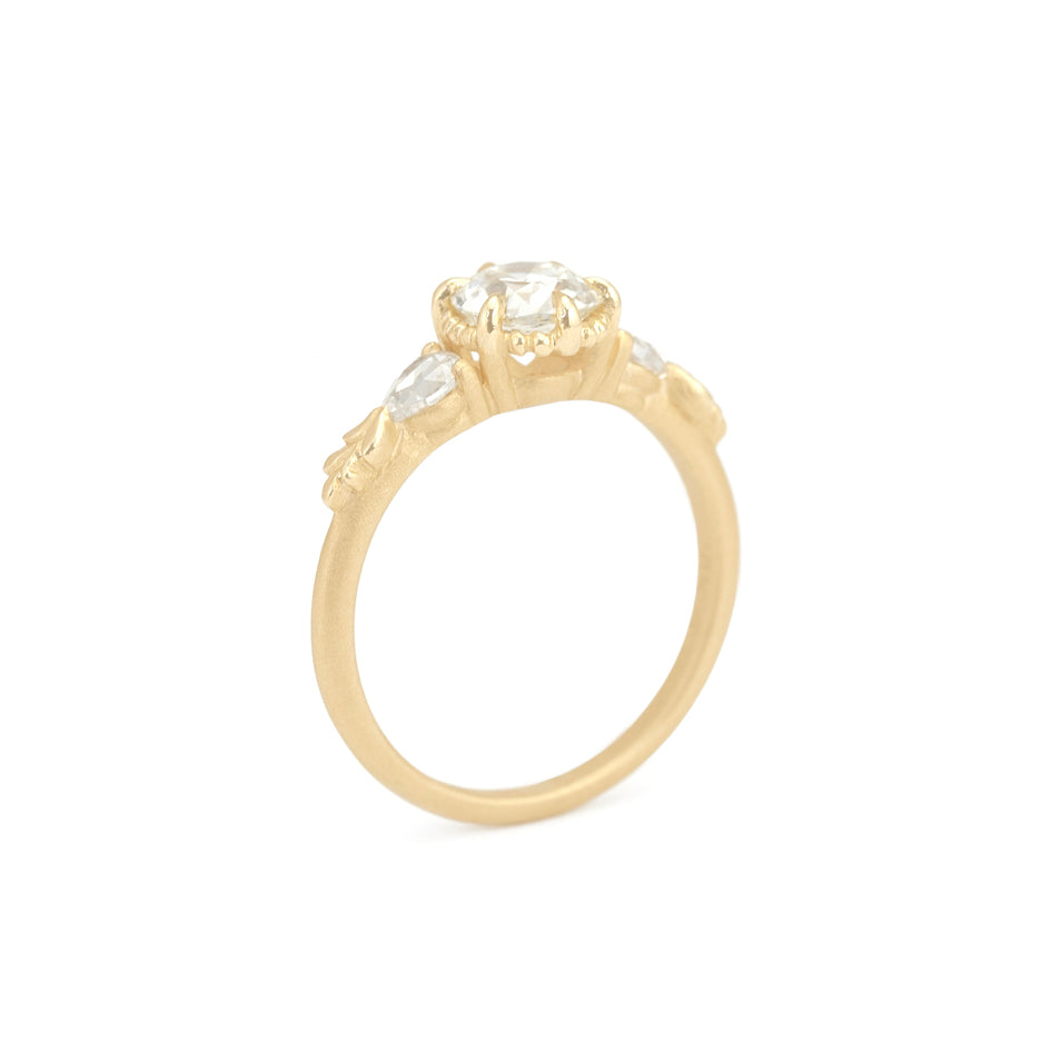 Diamond Engagement Ring in Yellow Gold with Botanical Detailing Through Finger View