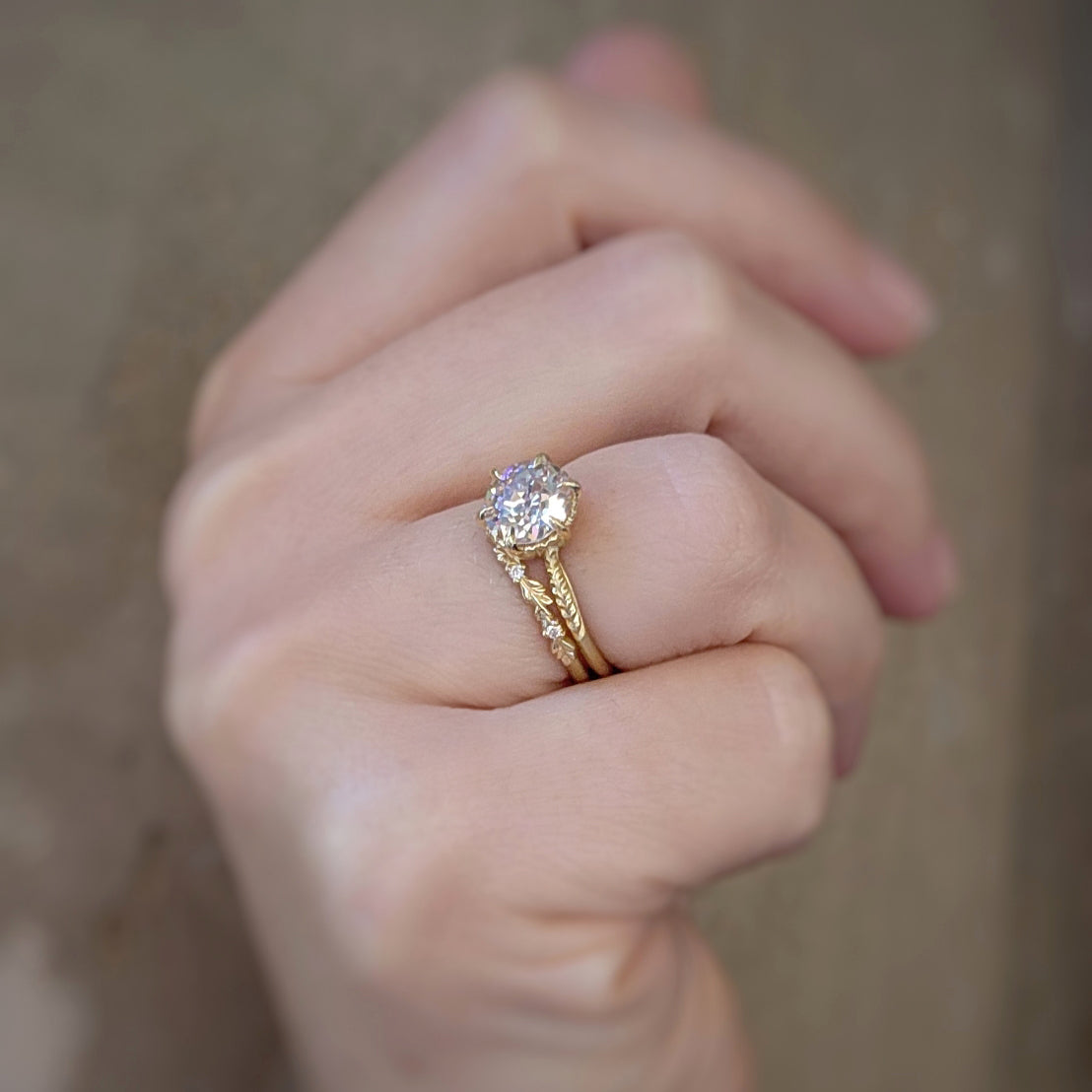 Handmade thin wedding band featuring diamonds and hand carved floral Wood Nymph details in 18K yellow gold by Designer Megan Thorne