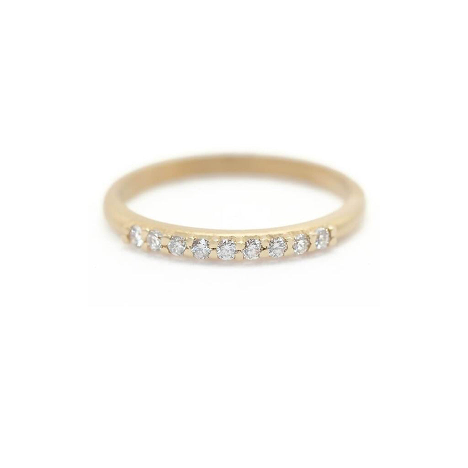 Handmade pave wedding or stacking band with diamonds and beading in 18K yellow gold by Designer Megan Thorne