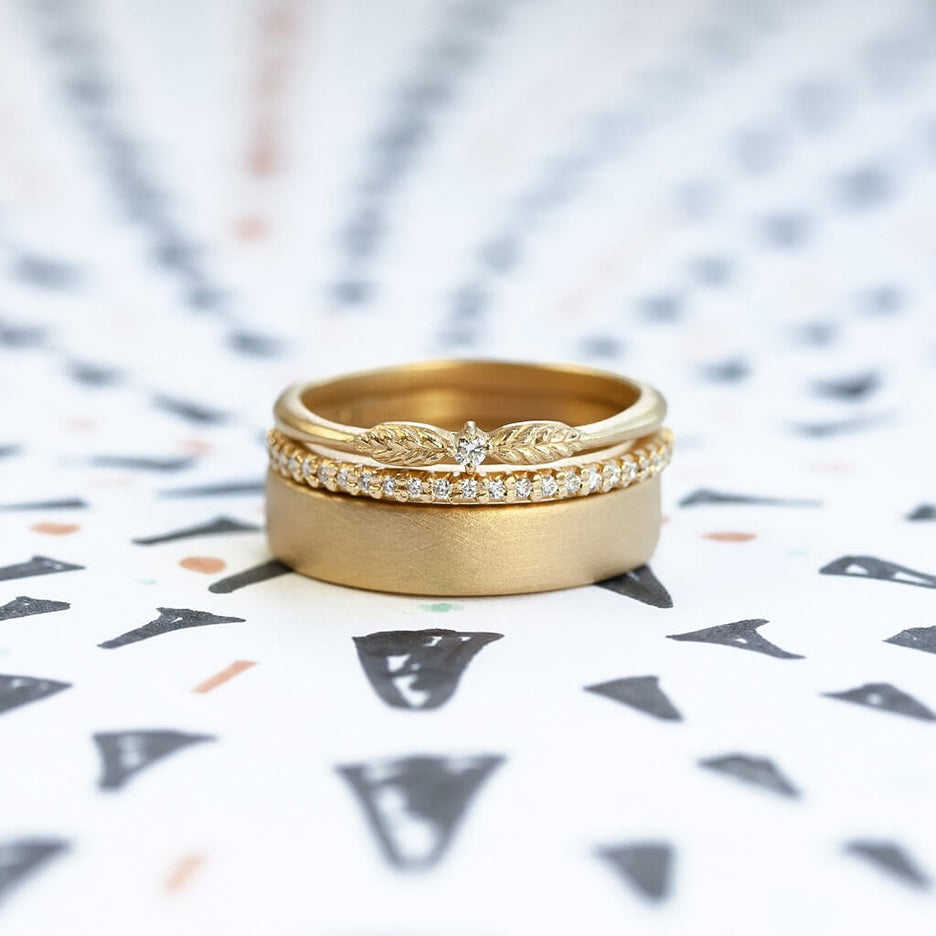 Handmade pave wedding or stacking band with diamonds and beading in 18K yellow gold thin version by Designer Megan Thorne