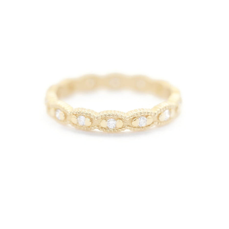 Handmade diamond eternity wedding band or stacking ring with ribbing and beading in 18K yellow gold by Designer Megan Thorne