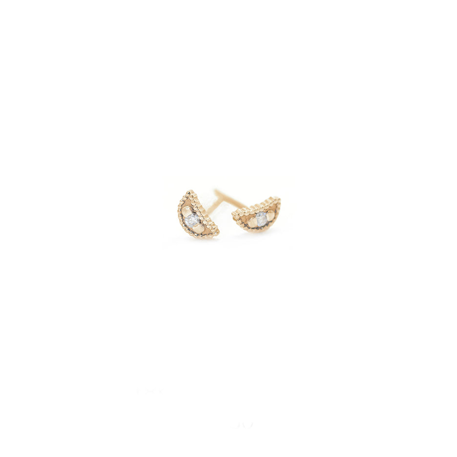Handmade crescent shaped stud earrings with ribbing, beading and diamonds in 18K yellow gold by Designer Megan Thorne