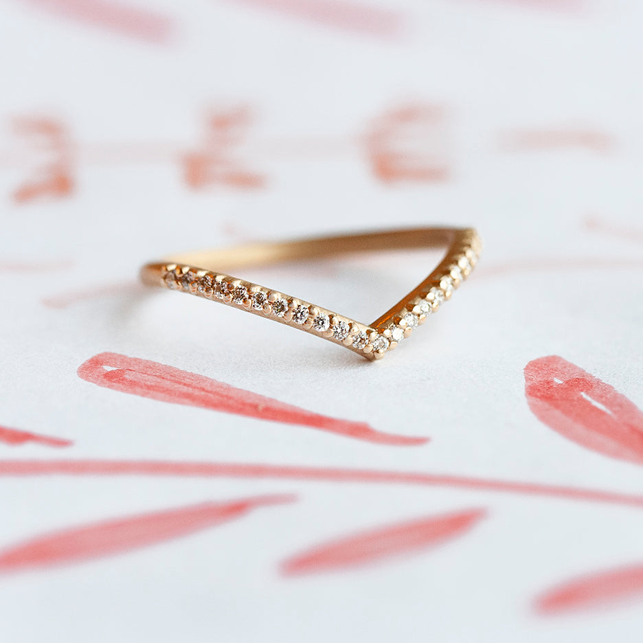 Diamond Wedding V Guard Band in Yellow Gold on Colored Background