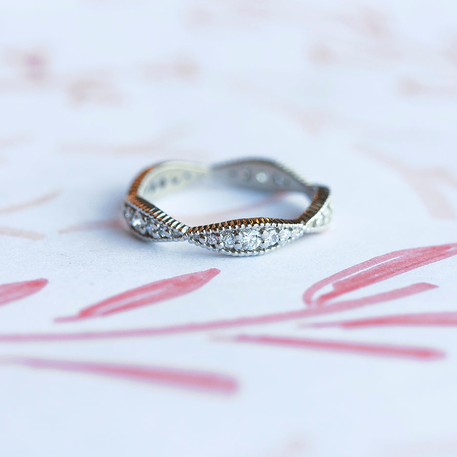 Handmade pave wedding or stacking band scalloped to nestle close to engagement ring with diamonds and ribbed details in 18K white gold by Designer Megan Thorne