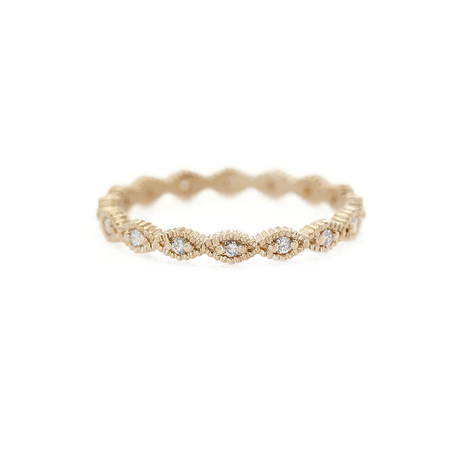 Handmade thin eternity wedding band or stacking ring with diamonds and geometric ribbed scallops in 18K yellow gold by Designer Megan Thorne