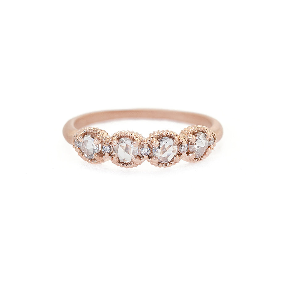 Handmade wedding or stacking band with rose cut diamonds and brilliant cut accents with ribbed details in 18K rose gold by Designer Megan Thorne